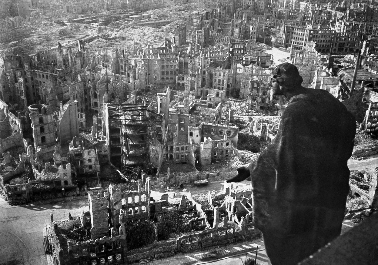 Ruined buildings cover Dresden, a railway hub moving troops towards the eastern front. Bombing caused fires that destroyed residential districts and killed thousands of civilians.